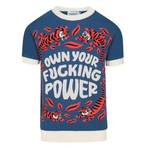 Blue knit short-sleeved shirt with orange tiger motif and “own your power” logo